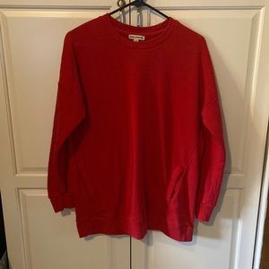 Red sweatshirt with pockets